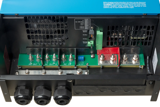 Close-up of a power inverter with electronic components and connectors.