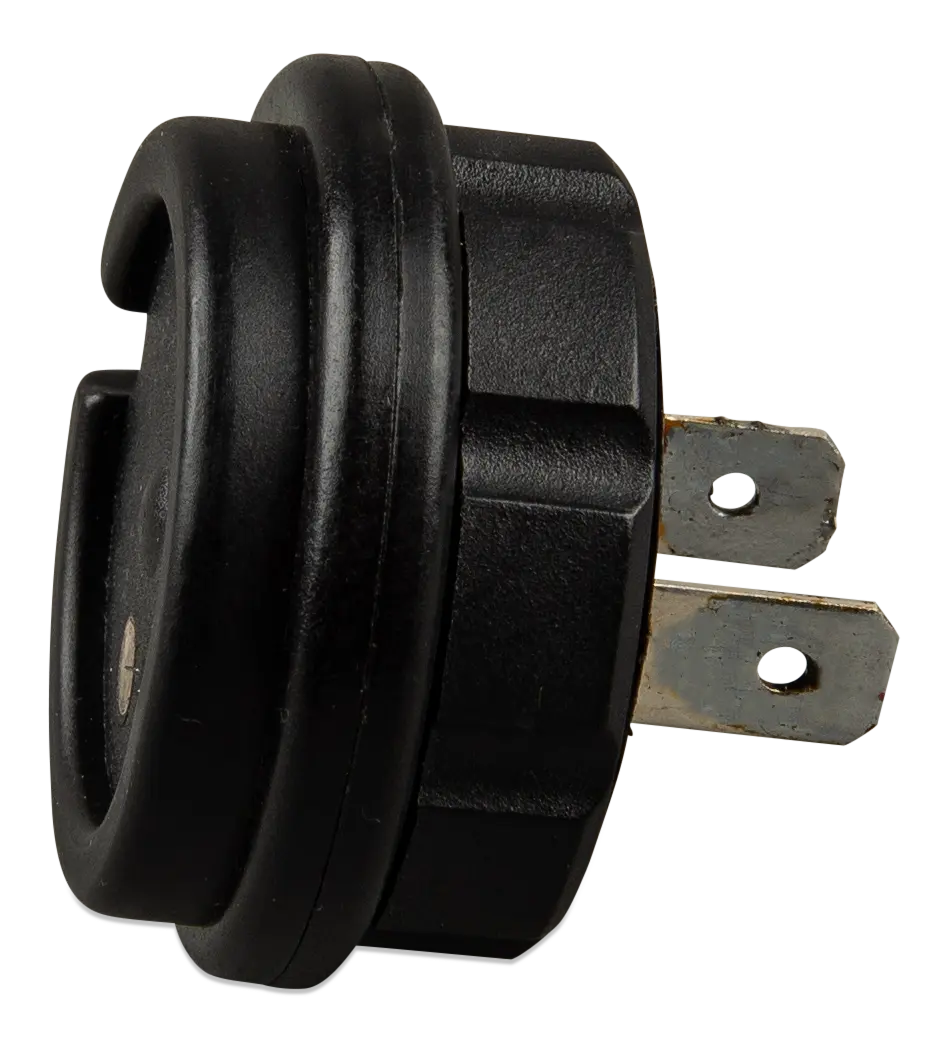 Black round toggle switch on a white background