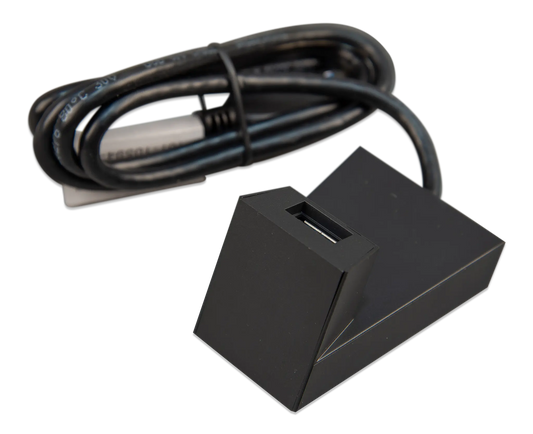 Black electronic device with a cable on a white background