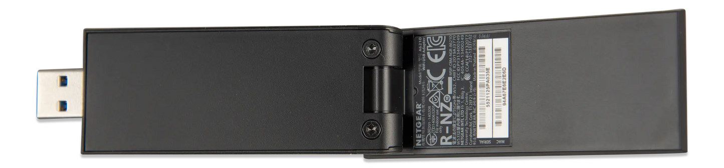 Black USB adapter with label on a white background