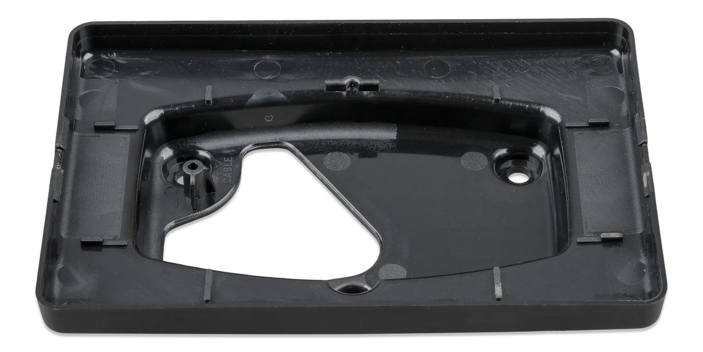 Black plastic component on a white background