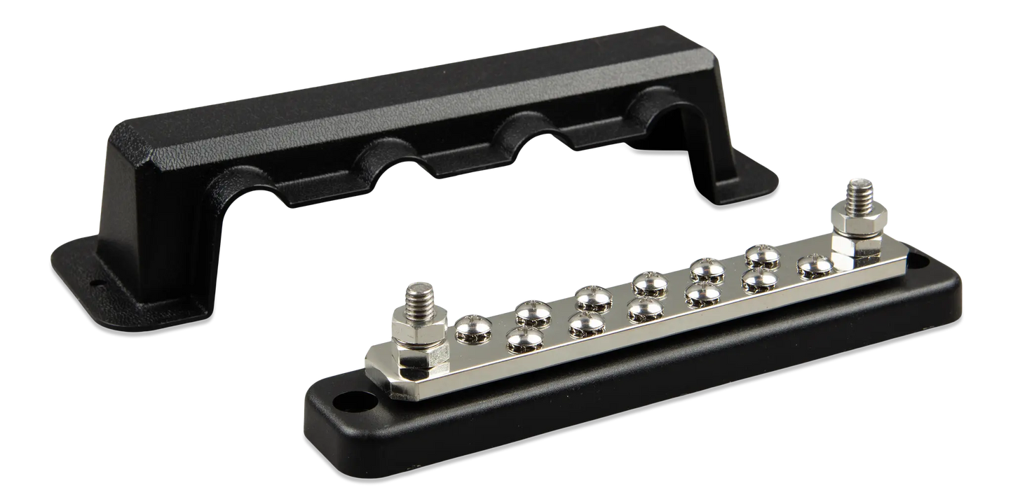 Black metal terminal block with silver screws on a white background