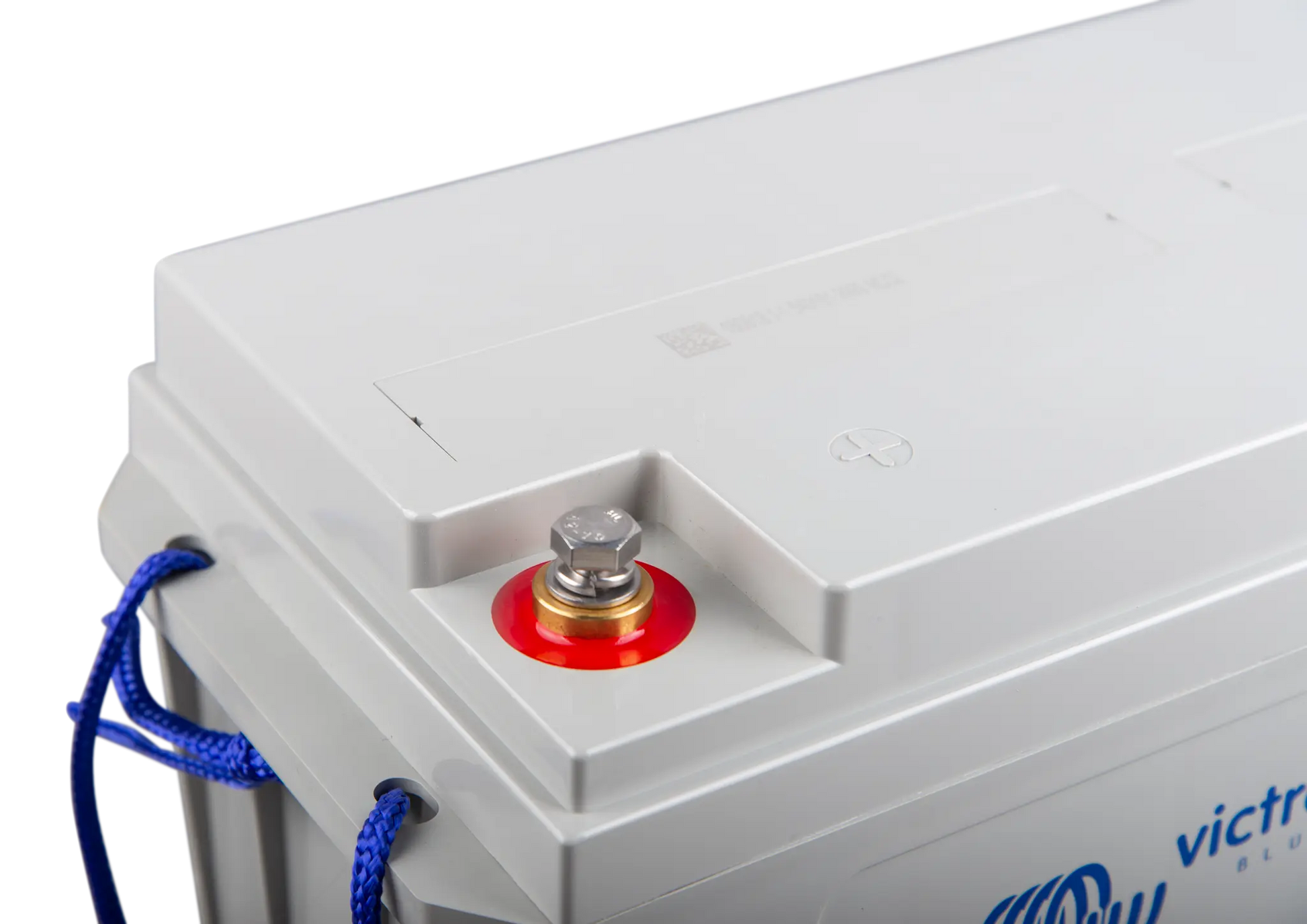 Close-up of a battery with a red terminal and blue cable, branded 'Victor'.