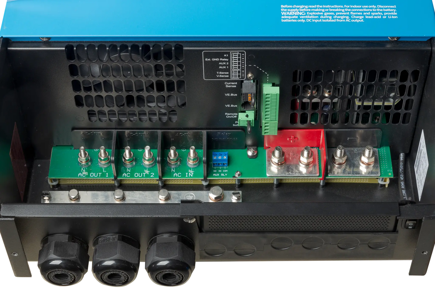 Close-up of a power inverter with electronic components and connectors.
