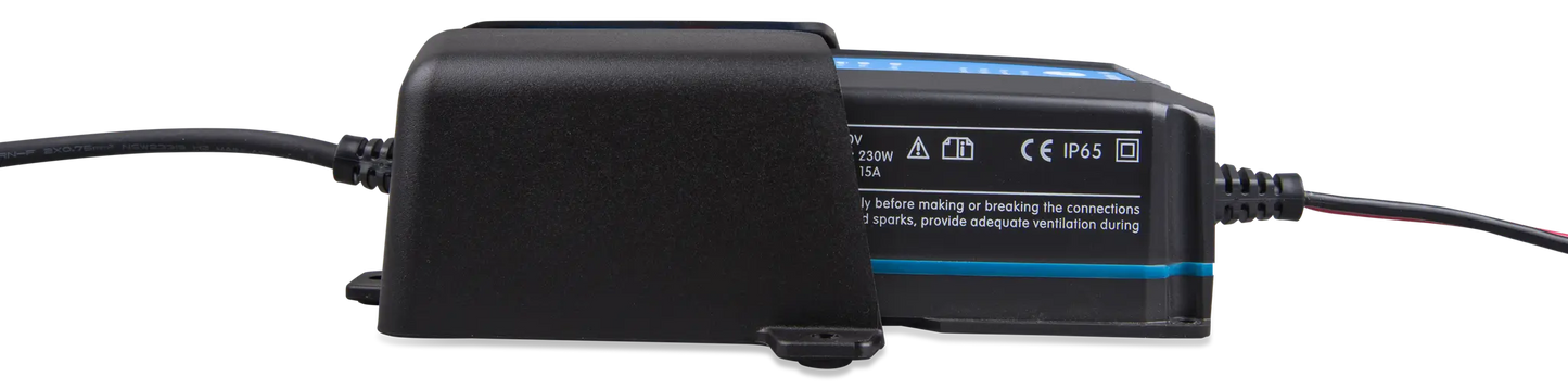 Black electronic device with cables on a white background