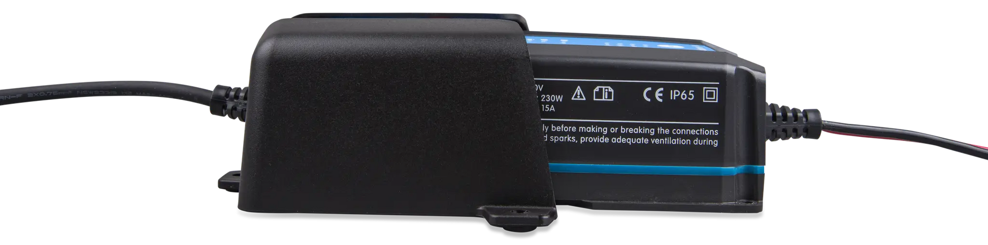 Black electronic device with cables on a white background