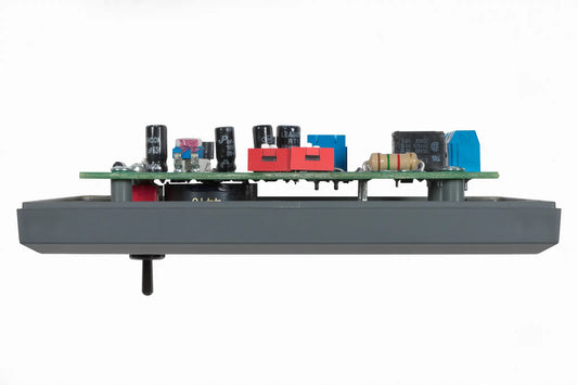 Electronic component board with various components on a white background