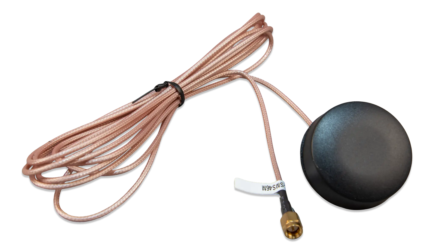 Black antenna with coiled cable on a white background