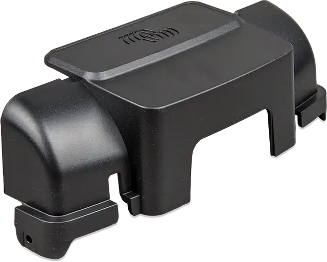 Black plastic component on a white background